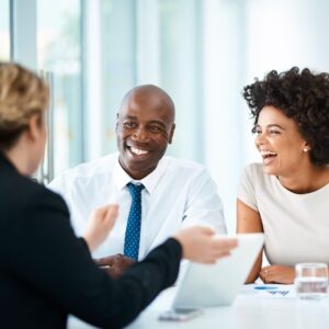 couple meeting with wealth management advisor