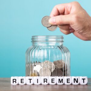 coins going into retirement jar