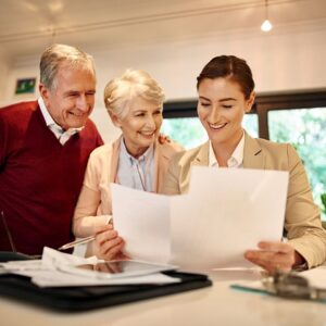 older couple meeting with a female advisor