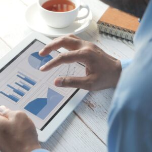 person viewing finances on tablet