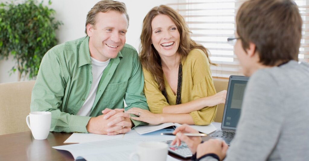couple meeting with wealth management advisor