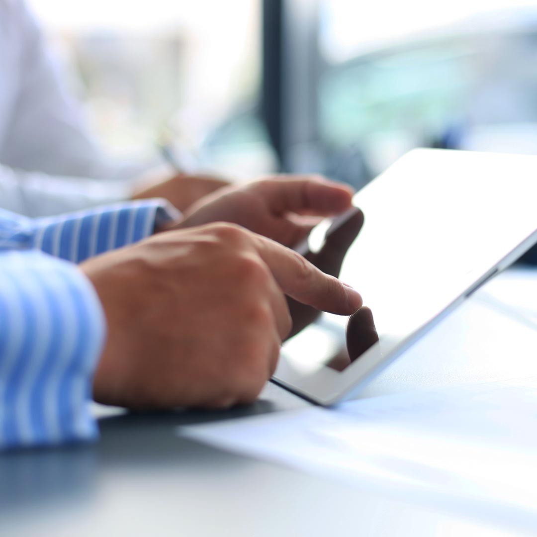 Business man holding a tablet