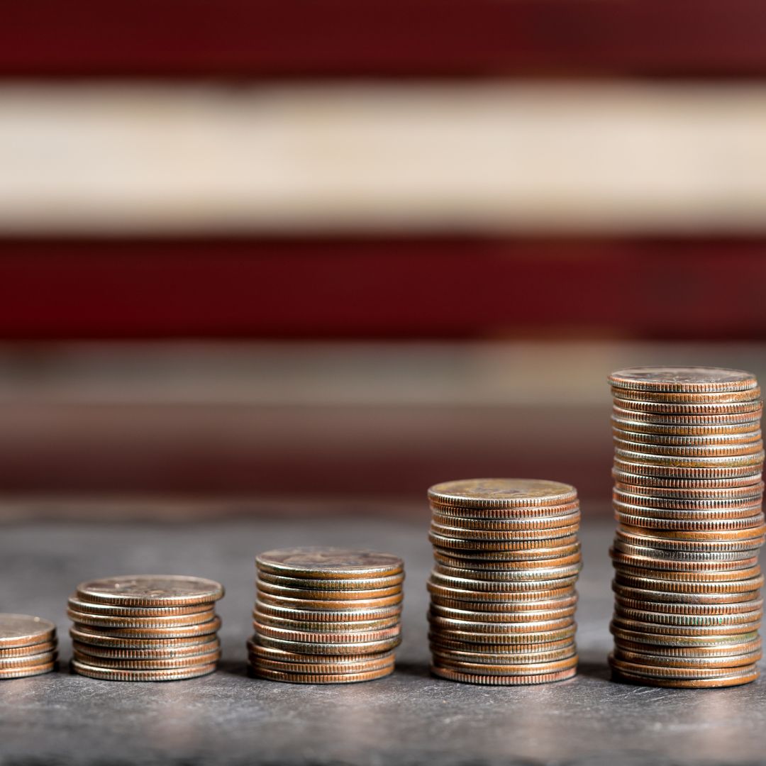 increasing stacks of coins