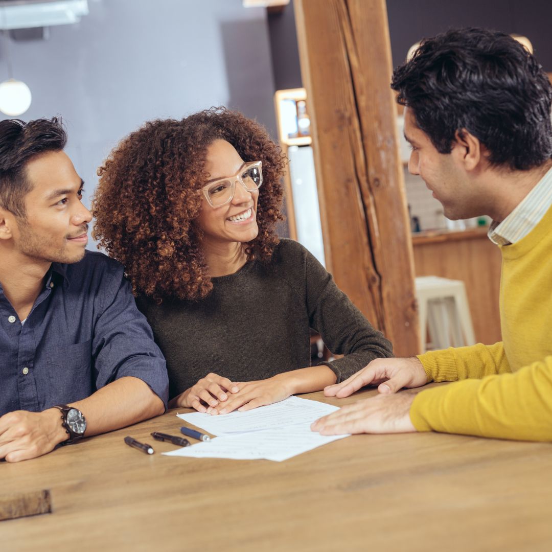 couple working with a retirement planner