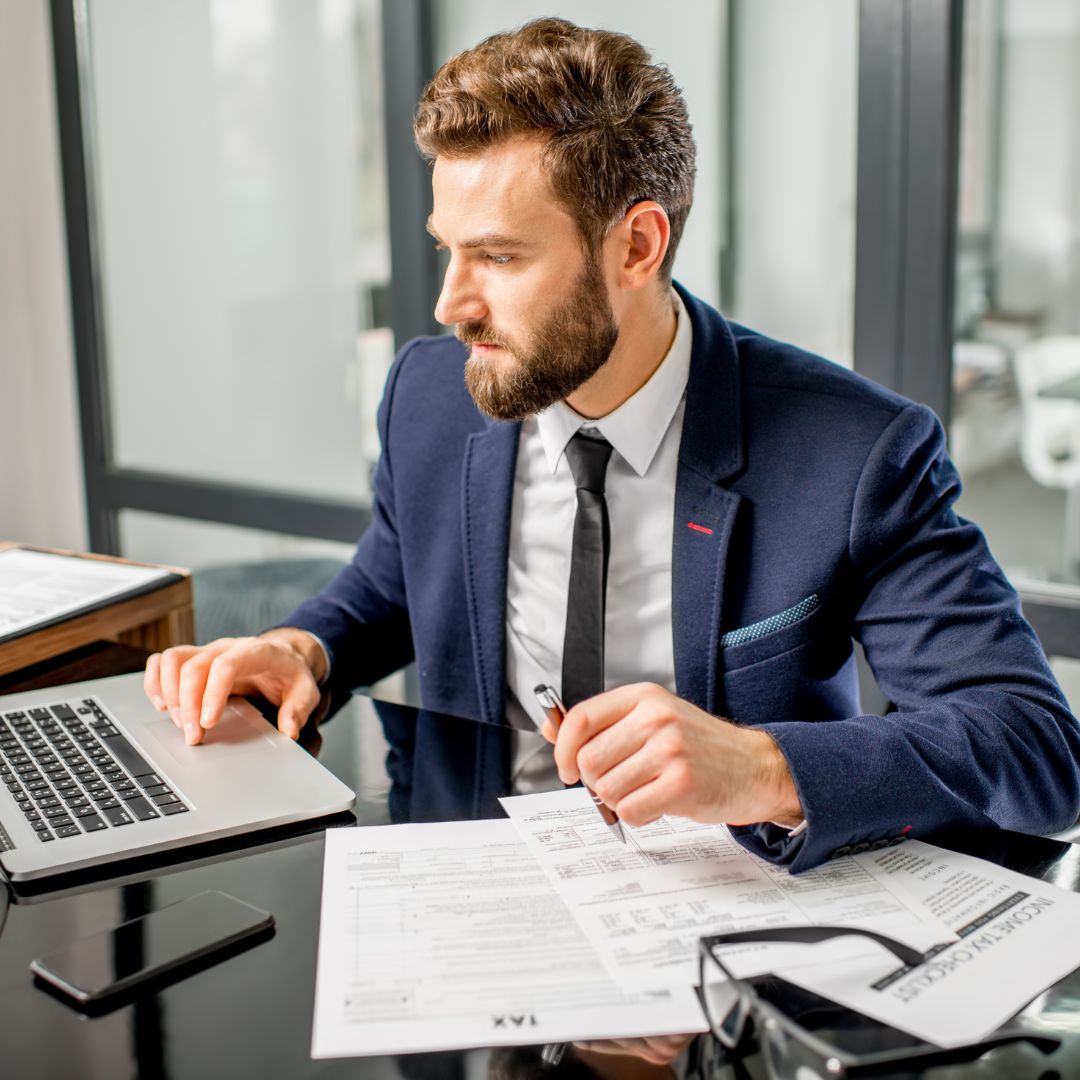 man doing taxes