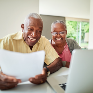senior couple on computer