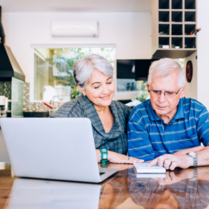 senior couple on computer