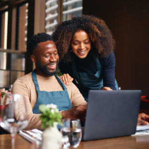 two people on computer