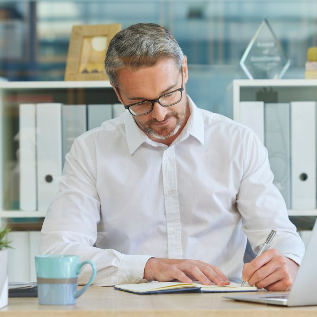 Man writing on paper