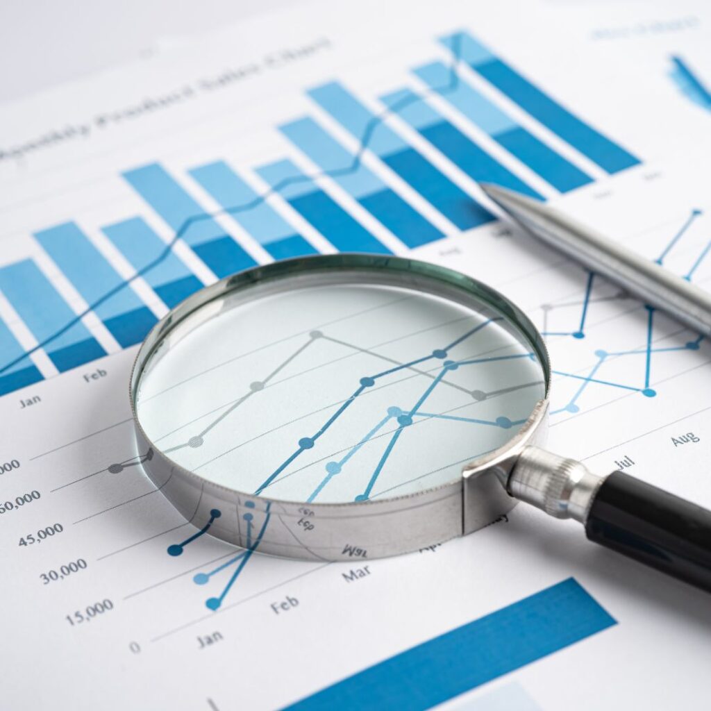 magnifying glass over a graph
