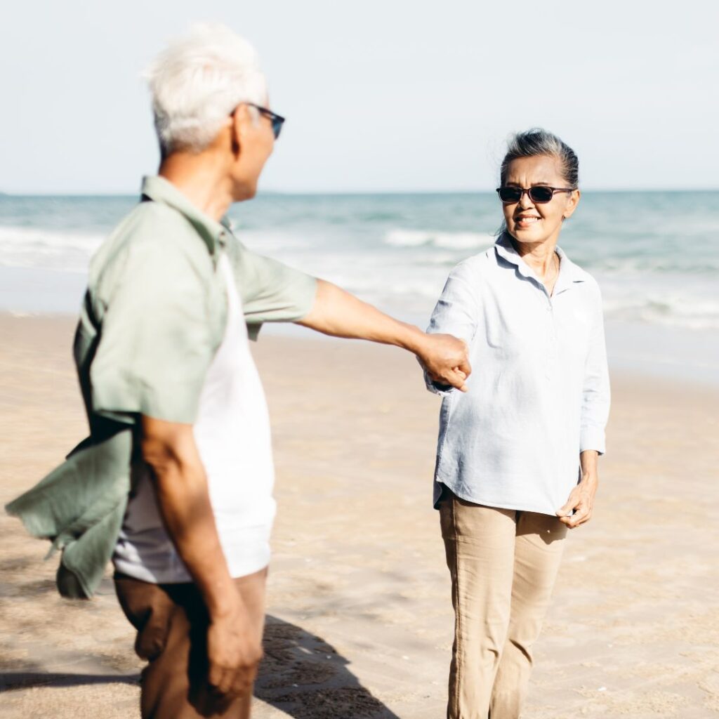 senior couple on the beach