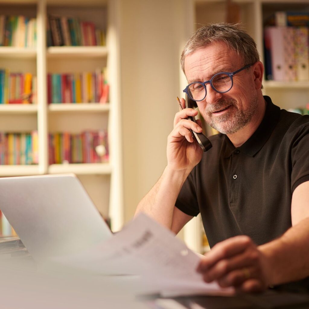 man figuring out taxes