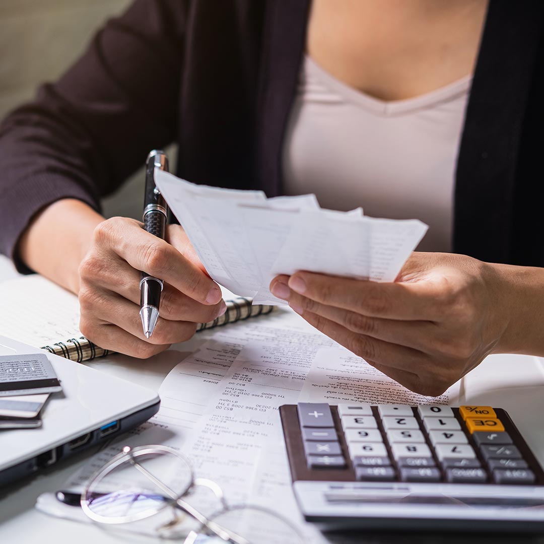 woman going over tax credits and deductions