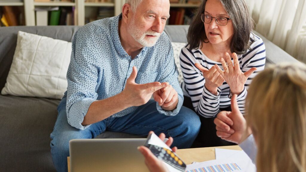 confused couple during financial meeting