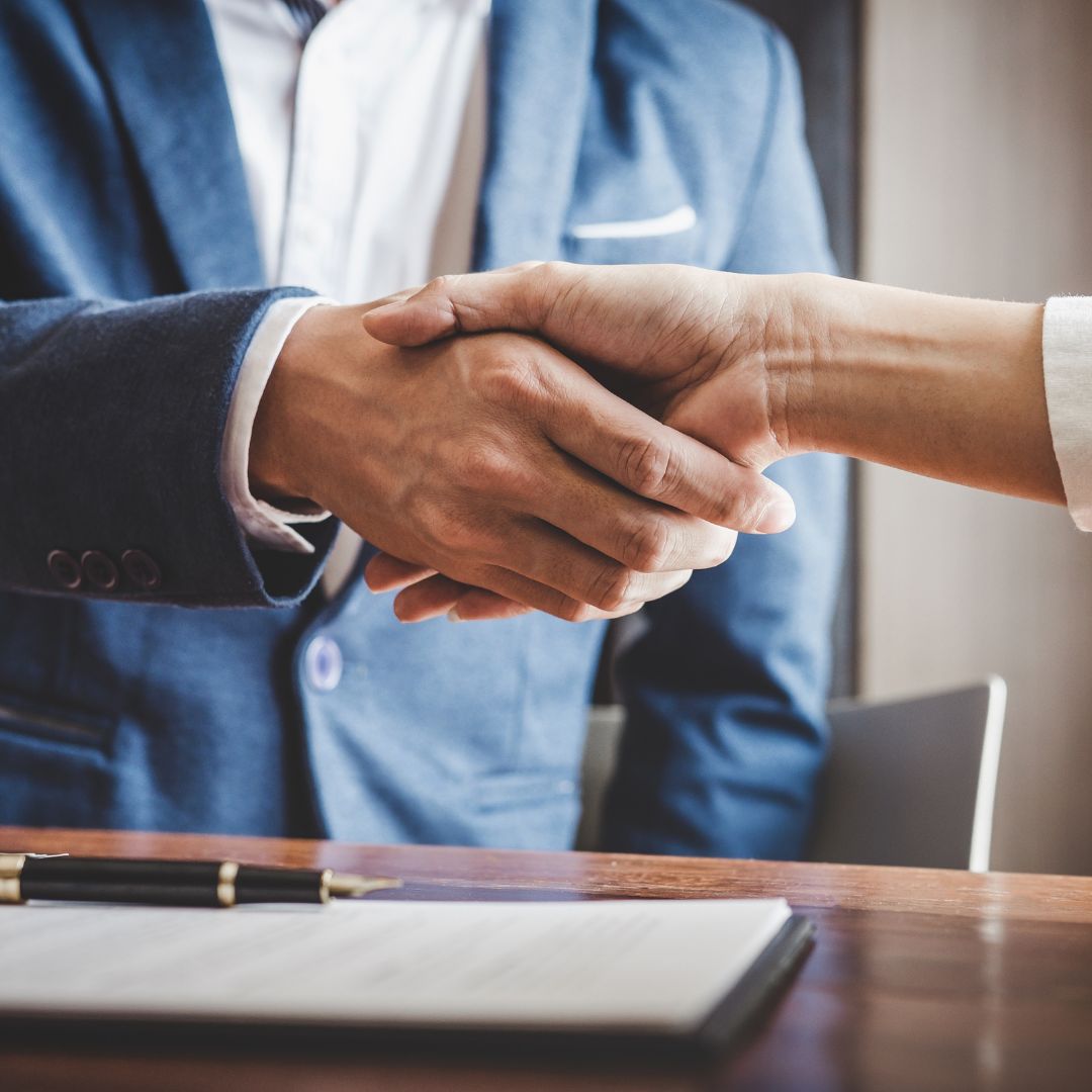 two people shaking hands