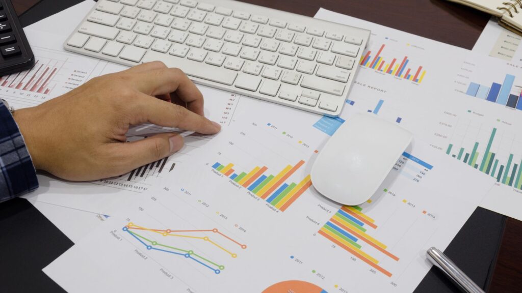 a financial planner looking at a clients numbers