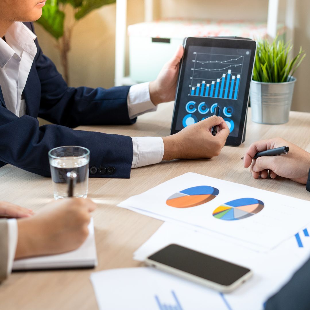 a financial planner going over numbers with a client