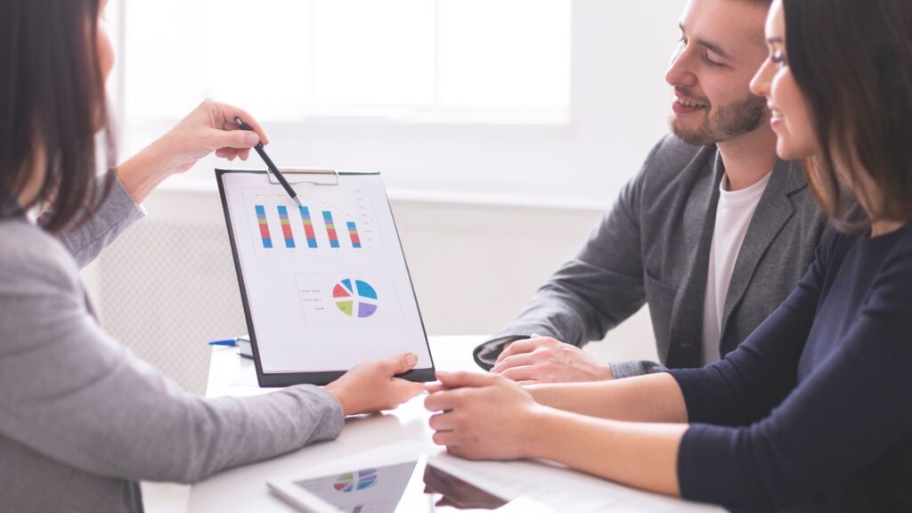 a wealth manager going over an account with the client