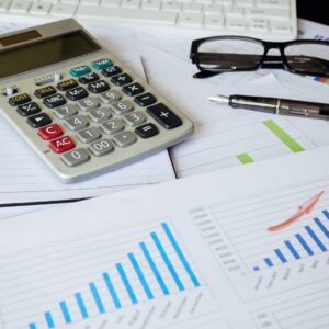 Graphs with calculator behind it