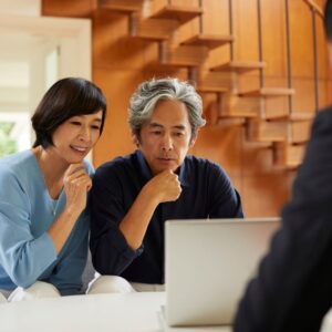 img of a couple talking to an advisor